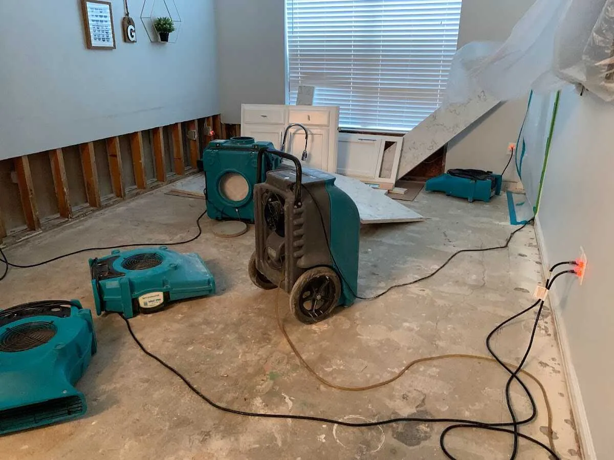 Dehumidifier in flood-cut room for Water Damage Restoration in Powder Springs